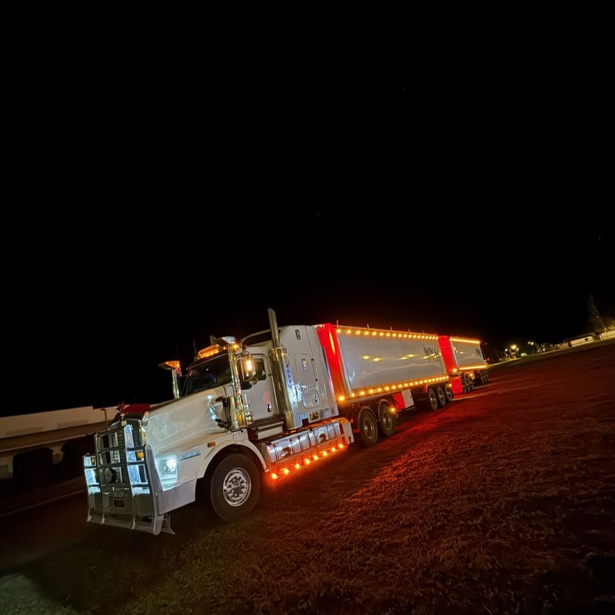 Truck with marker lights at night